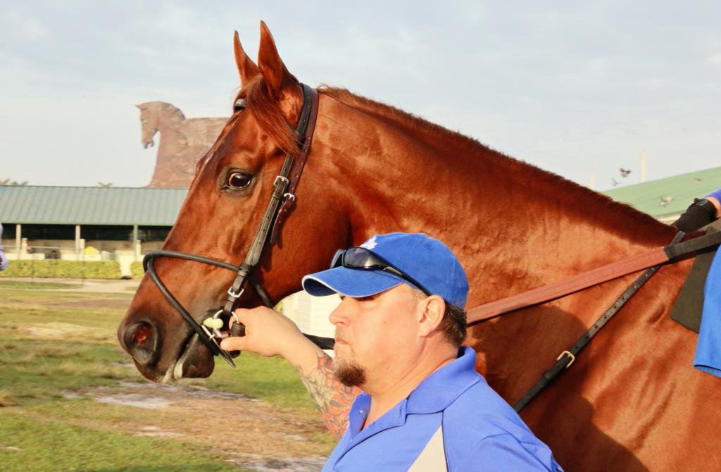 Groom Edward Krawcar with Breaking Lucky with the Pegasus statue in the background. (Julie June Stewart photo)